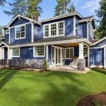 Large home with blue siding