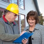 Contractor discussing renovation with female client