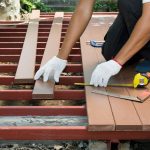 Contractor installing a new deck